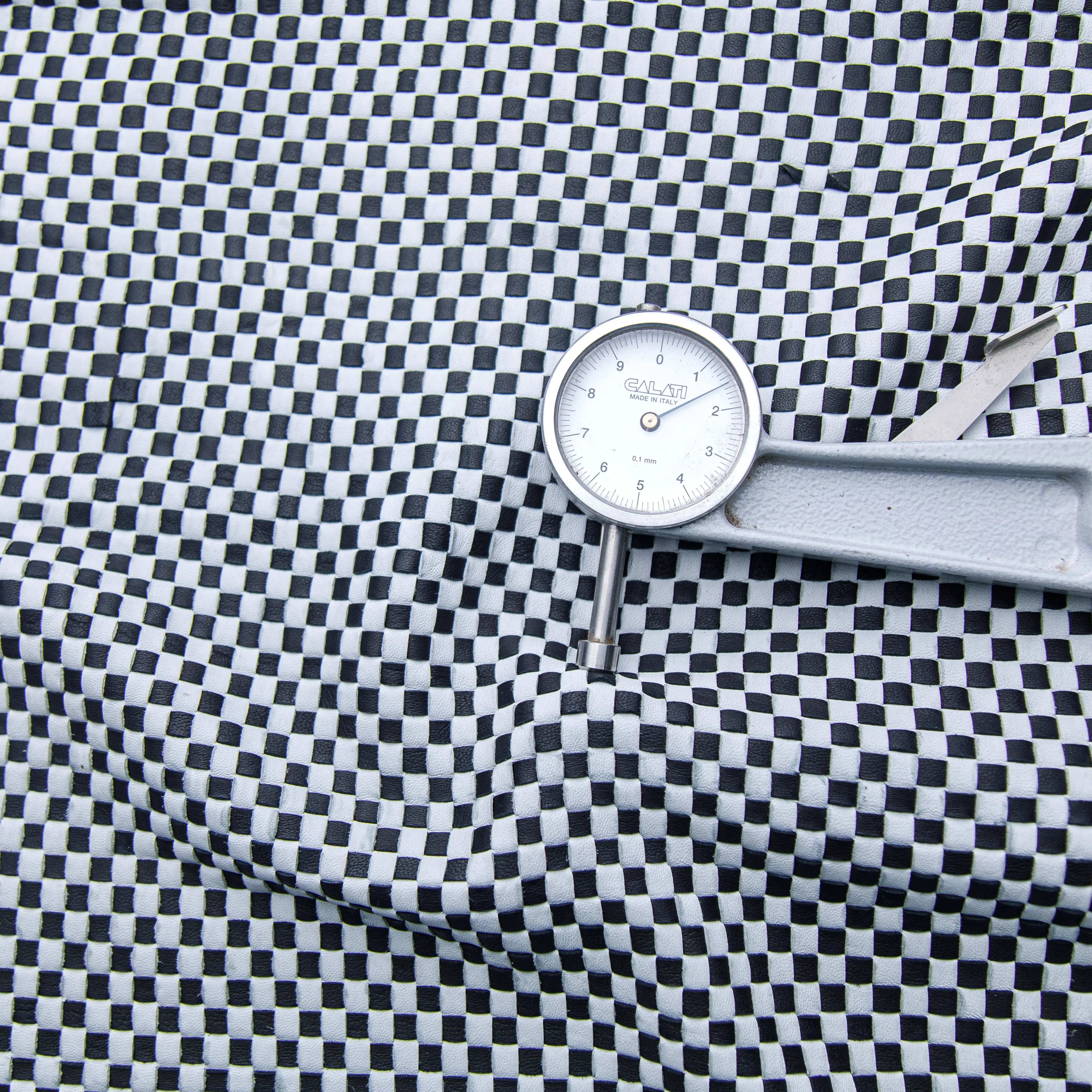 Chic Black and White Woven Leather
