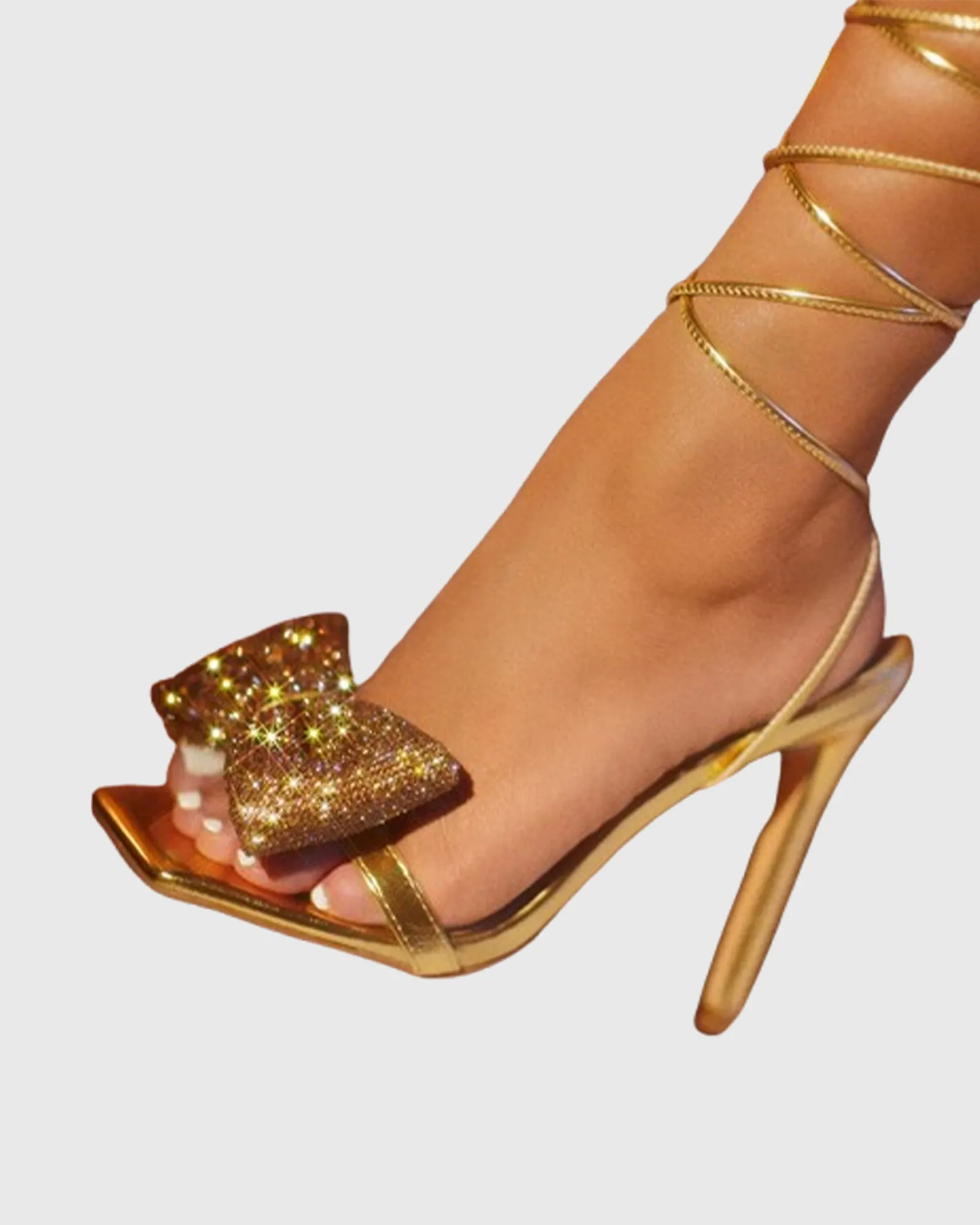 Nora Crystal Bow Lace Up Sandals In Gold